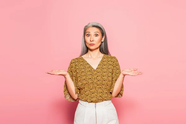 Discouraged Asian Woman Pointing Hands While Looking Camera Pink — Stock Photo, Image