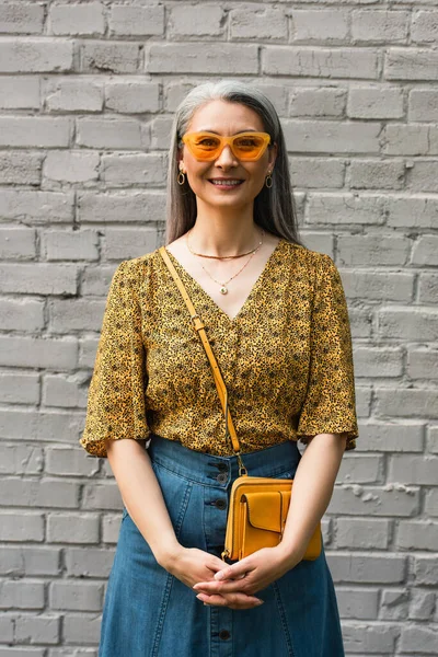 Happy Asian Woman Trendy Blouse Yellow Sunglasses Looking Camera Grey — Stock Photo, Image