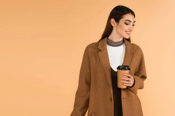 Happy Woman Stylish Coat Holding Takeaway Drink Isolated Beige — Φωτογραφία Αρχείου