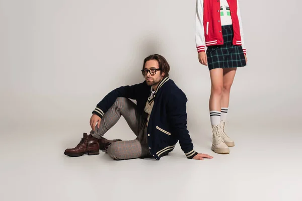 Stylish Man Blue Jacket Sitting Man Plaid Skirt Boots Grey — Photo