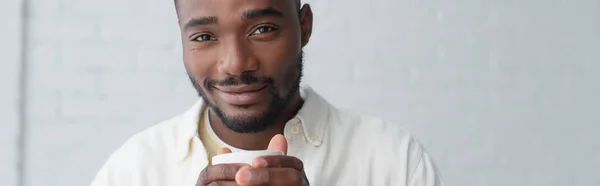 Cheerful African American Man Holding Cup Coffee Banner — Stock Photo, Image