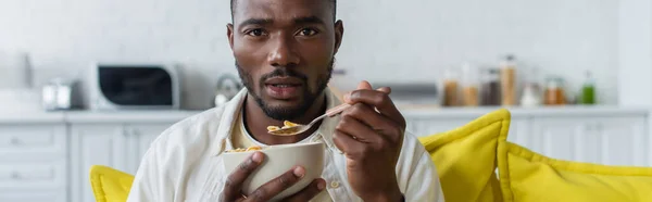 Young African American Man Holding Bowl Corn Flakes Spoon Banner — Stock Photo, Image