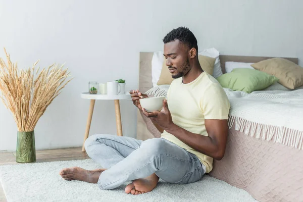 Bearded African American Man Sitting Crossed Legs Bed While Having — Stock Photo, Image