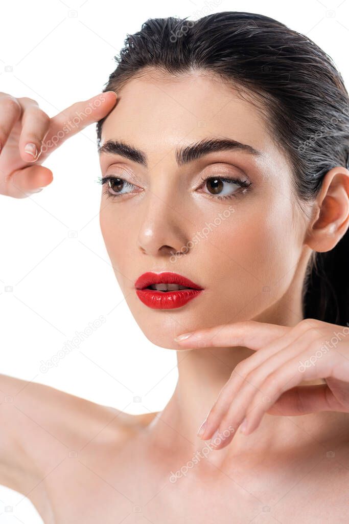 young woman with red lips posing isolated on white