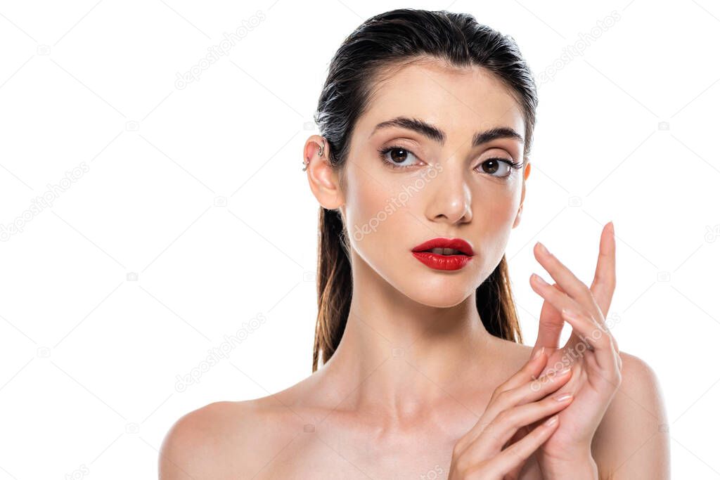 young woman with red lips and bare shoulders posing isolated on white