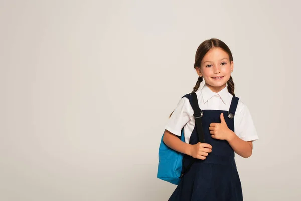 Colegial Feliz Com Mochila Azul Mostrando Polegar Para Cima Isolado — Fotografia de Stock