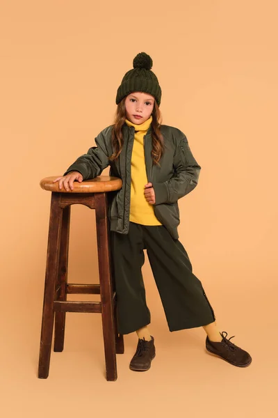 Stylish Child Autumn Outfit Looking Camera High Wooden Stool Beige — Stock Photo, Image