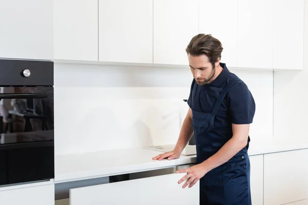 Handyman Opening Cabinet White Modern Furniture Kitchen — Stock Photo, Image