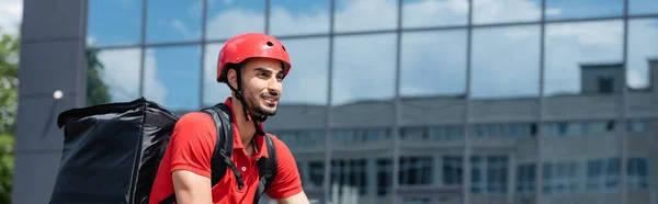 Cheerful Muslim Courier Helmet Thermo Backpack Outdoors Banner — Stock Photo, Image