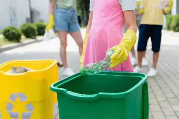 Cropped View Girl Rubber Gloves Holding Bottle Trash Can Outdoors — Stock Photo, Image
