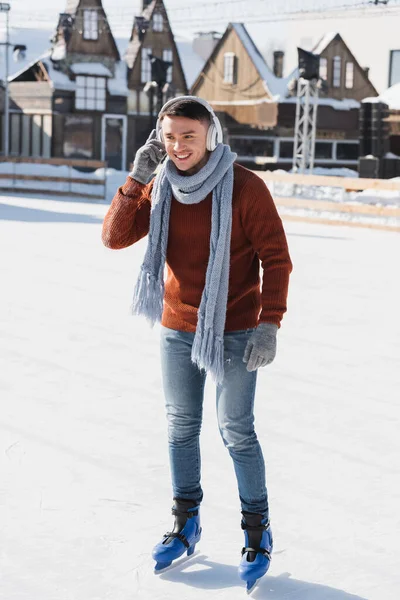 Full Length Joyful Young Man Sweater Scarf Listening Music While — Stock Photo, Image