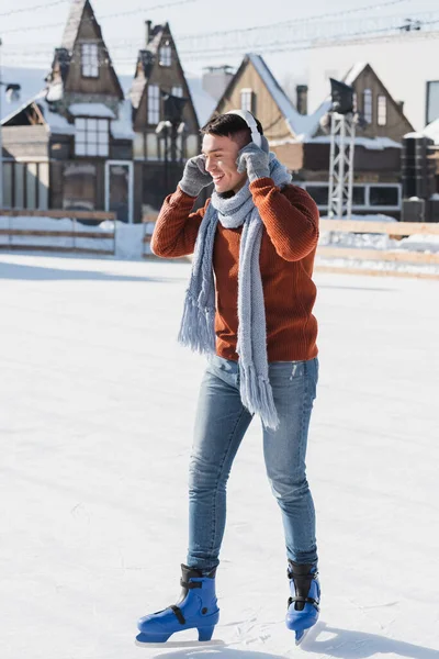 Full Length Cheerful Young Man Sweater Scarf Listening Music While — Stock Photo, Image