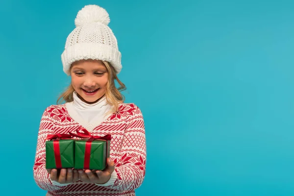 Happy Girl Knitted Hat Sweater Looking Green Gift Boxes Isolated — Stock Photo, Image