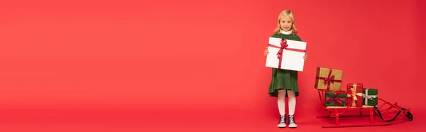 Full Length View Girl Big Gift Box Sled Presents Red — Stock Photo, Image