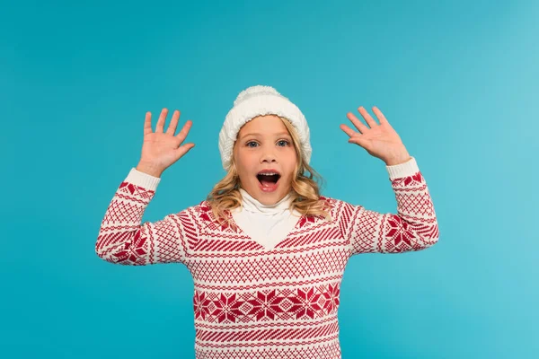 Excited Girl Warm Hat Sweater Showing Wow Gesture Isolated Blue — Stock Photo, Image