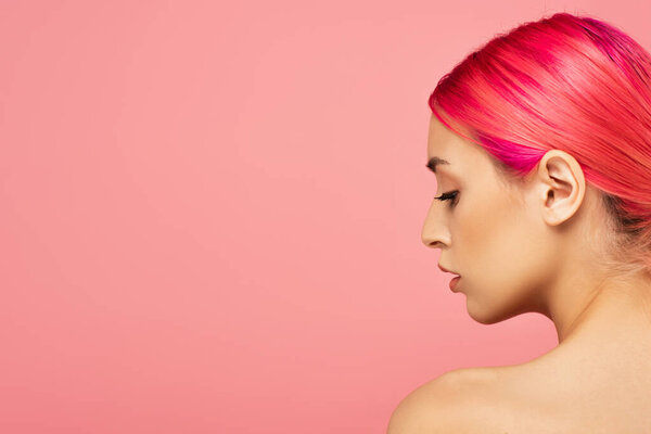 profile of pretty young woman with colorful hair and bare shoulder isolated on pink 