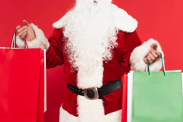 Cropped View Santa Claus Holding Purchases Isolated Red — Stock Photo, Image