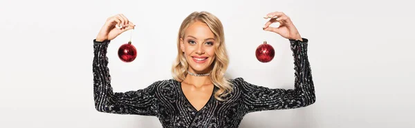 Glamour Woman Black Shiny Blouse Holding Christmas Balls While Smiling — Stock Photo, Image