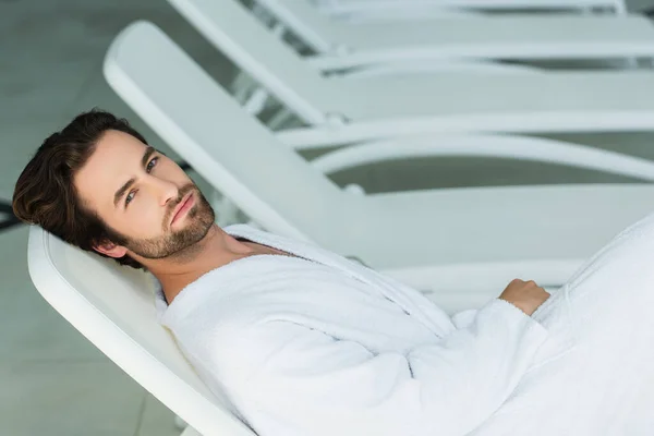 Young Man Looking Camera Deck Chair Spa Center — Stock Photo, Image