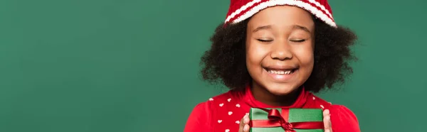 Smiling African American Child Hat Closing Eyes While Holding Present — Stock Photo, Image