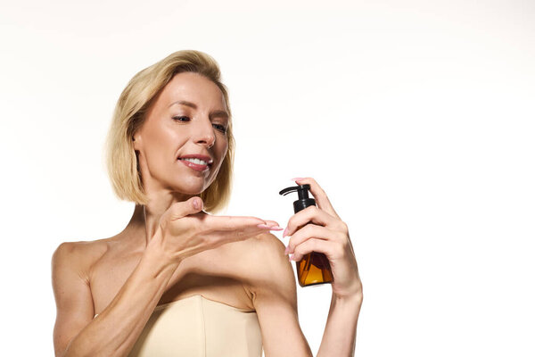 Beautiful woman with short blonde hair highlights her skincare routine and healthy skin.