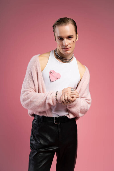 A confident man showcases his vibrant style, celebrating love on Valentines Day with flair.