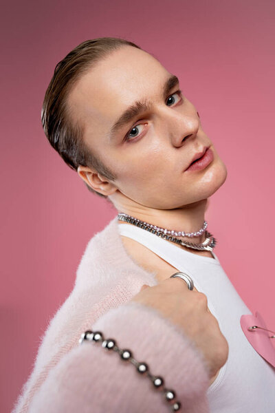 A man expresses his unique style and love for Valentines Day in a colorful setting.