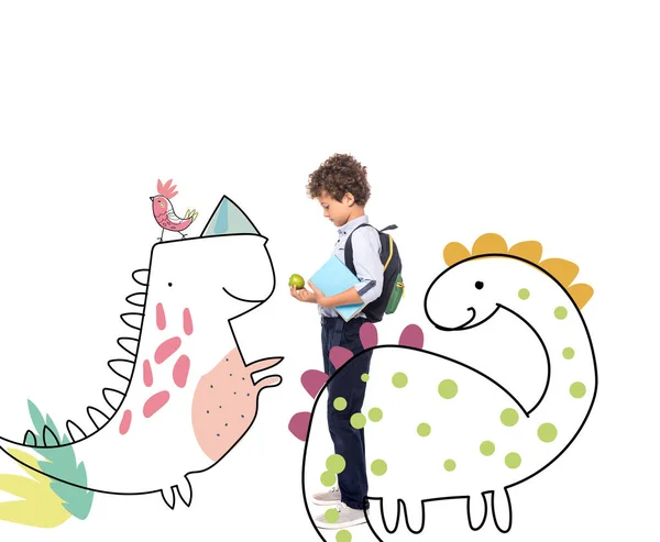 Side view of schoolboy with backpack and book holding apple near magic characters illustration on white — Stock Photo