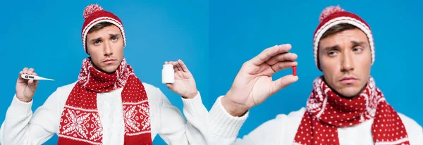 Colagem de homem doente em malhas segurando termômetro e frasco de comprimidos, olhando para pílula vermelha isolada em azul, banner — Fotografia de Stock