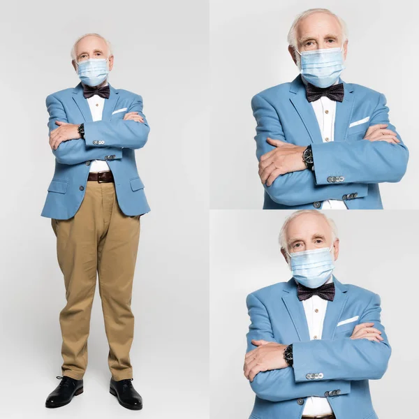 Senior man in medical mask and jacket standing with crossed arms on grey background — Stock Photo