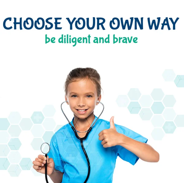 Child in costume of doctor holding stethoscope while showing thumb up near choose your own way be diligent and brave lettering on white — Stock Photo