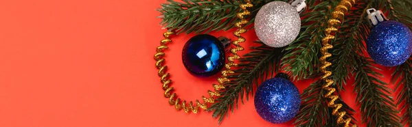 Top view of decorated Christmas tree on red background, banner — Stock Photo