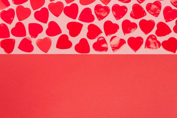 Top view of hearts on red and pink background — Stock Photo