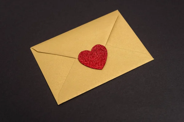 Valentines envelope with heart isolated on black — Stock Photo