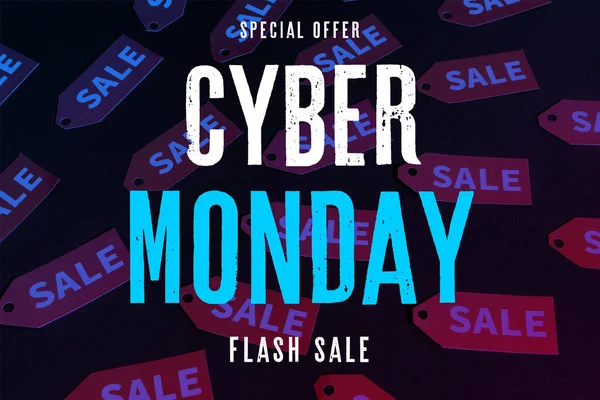 Special offer, cyber monday and flash sale lettering near red labels on black background — Stock Photo