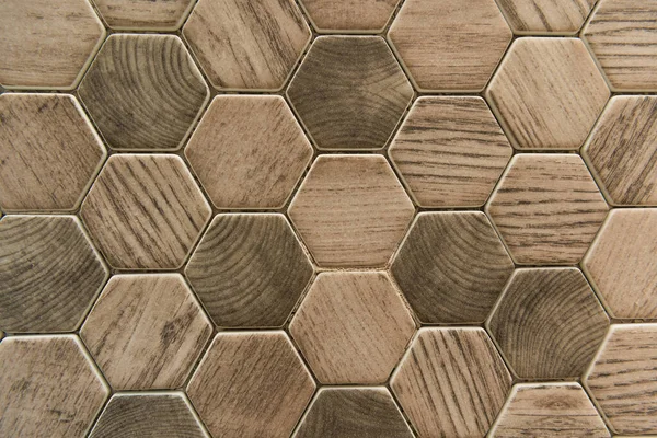 Fondo con azulejos de cerámica hexágono, con imitación de madera, vista superior - foto de stock