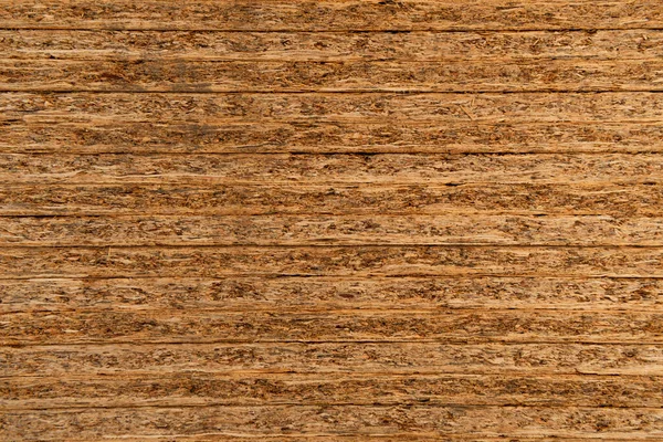 Background of natural, stacked pressed wood sheets — Stock Photo