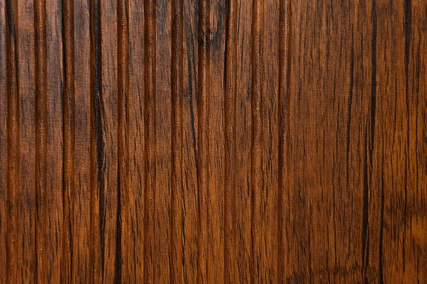 Background of brown, laminated plastic, with wood imitation, top view — Stock Photo