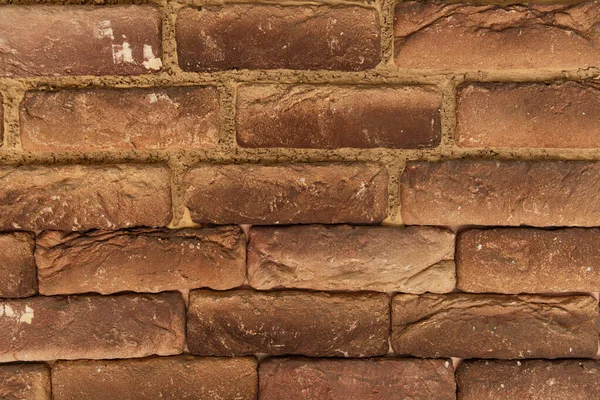 Fondo de la pared hecha de ladrillos de terracota natural, vista superior - foto de stock