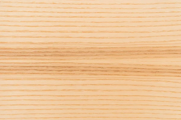 Vista superior del suelo laminado de madera marrón claro, texturizado - foto de stock
