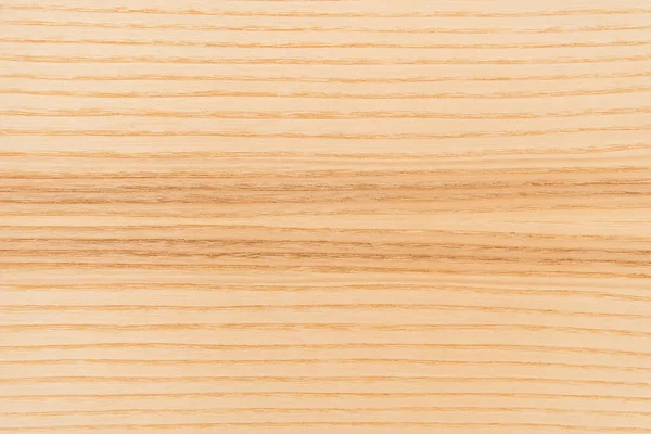 Vista superior del suelo laminado de madera marrón claro, texturizado - foto de stock