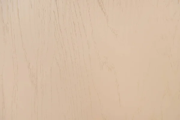 Fondo de color marrón pastel, superficie laminada de madera, vista superior - foto de stock