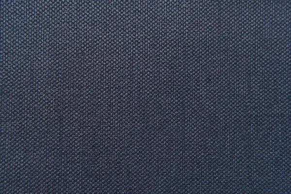 Background of dark blue, textured surface, with sackcloth imitation, top view — Stock Photo