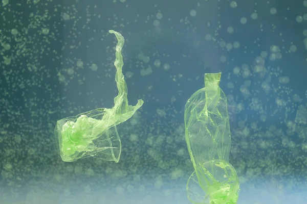 Plastic garbage underwater, ecology concept — Stock Photo