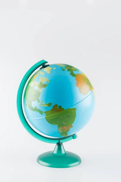 Earth globe on stand isolated on grey, ecology concept — Stock Photo