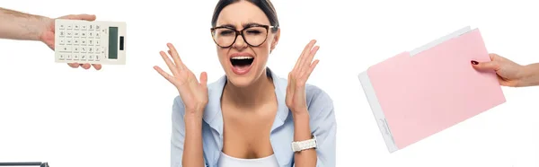 Angry businesswoman shouting near coworkers with documents and calculator isolated on white, banner — Stock Photo