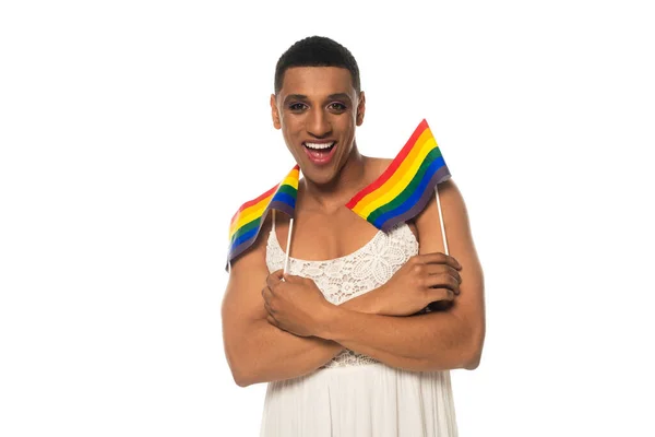 Happy african american transgender woman in sundress holding lgbt flags isolated on white — Stock Photo