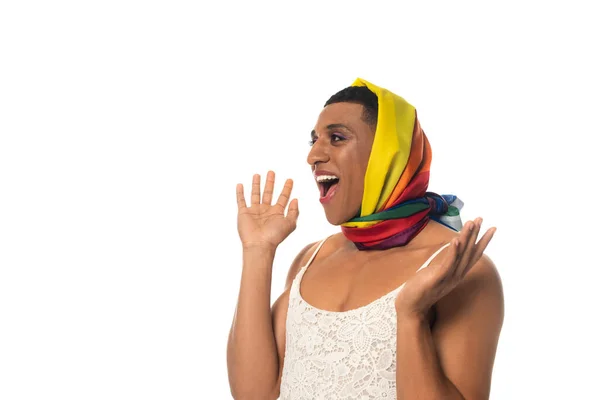 Astonished african american transgender man in lgbt colors head kerchief showing wow gesture isolated on white — Stock Photo