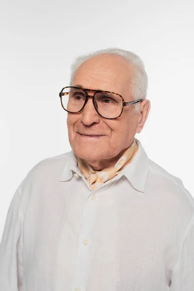 Portrait of smiling elderly man in glasses isolated on white — Stock Photo