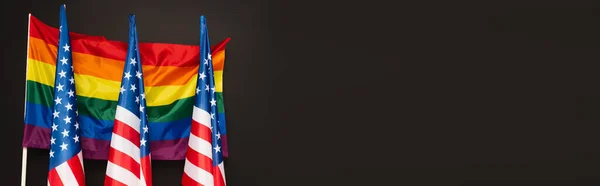 American and colorful lgbt flags isolated on black, banner — Stock Photo